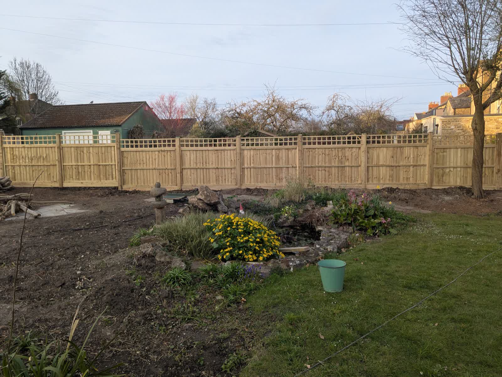 Finished garden with new featheredge fence by Perry's All Outdoor Solutions