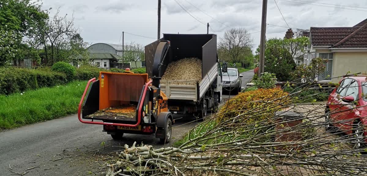 Perry's truck and wood chipper on site